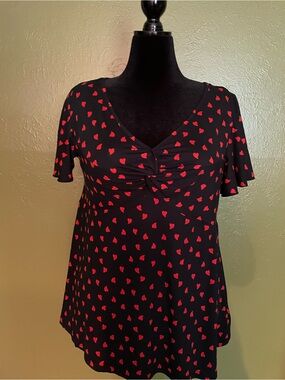 BloomChic Black Top with Red Heart Print V-Neck